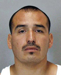 Paul Ray Castillo is shown in a San Jose Police Department file photo on Saturday, Sept. 17, 2011 in San Jose, Calif. Police are searching Saturday for Castillo, 33, of San Jose, as the suspect in a violent carjacking and robbery rampage that left a woman prominent in the Vietnamese-American community dead, another man hospitalized and city leaders stunned after police hit the suspect s vehicle with gunfire but he still got away. (Courtesy of San Jose Police Dept.) (SAN JOSE POLICE DEPARTMENT)
