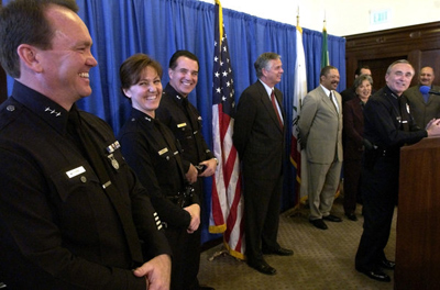Hermosa Beach has selected LAPD Commander Sharon Papa as its new police chief. She is shown here, second from left, being promoted to deputy chief by former LAPD Chief Bill Bratton. (Myung J. Chun / Los Angeles Times / November 12, 2002)