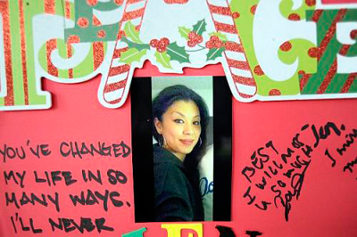 A photograph of Jennifer Kim, 26, one of the four victims of the Northridge shooting on Dec. 2, 2012, at a memorial outside the home in the 17400 block of Devonshire Street in Northridge. (Hans Gutknecht/Staff Photographer)