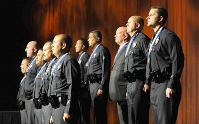 LAPD Medal of Valor recipients stand on stage during the award ceremony Thursday in Hollywood. (Wally Skalij / Los Angeles Times / May 26, 2011)