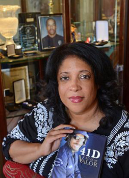 Lisa Simmons, the widow of LAPD SWAT officer Randal Simmons, who was killed in the line of duty, has written a book about her late husband, "41D: Man of Valor." (Brad Graverson/Staff Photographer) 