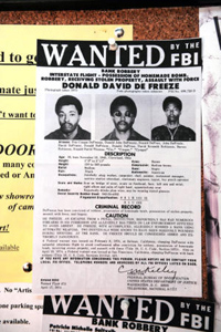 Wanted poster for Symbionese Liberation Army Leader Donald DeFreeze at the exhibit. (Hans Gutknecht / Staff Photographer)