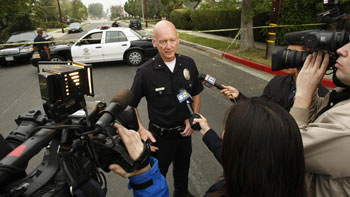 LAPD Cmdr. Andrew Smith addresses reporters at a 2013 news conference. Officials in Green Bay, Wisc., announced Tuesday that they had selected Smith as their next police chief. (Al Seib / Los Angeles Times)