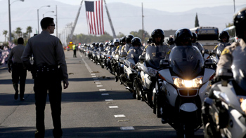 Thousands of law enforcement officials and members of the community gather to pay their respects to slain Los Angeles County sheriff's Sgt. Steve Owen at Lancaster Baptist Church. Brian van der Brug / Los Angeles Times