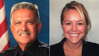 Palm Springs officers Jose "Gil" Vega and Lesley Zerebny are seen in a billboard outside the Palm Springs Convention Center. (Credit: KTLA)