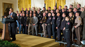 President Obama speaks to the National Association of Police Organizations TOP COP award winners Saturday, May 11, 2013 (Official White House Photo by Pete Souza)